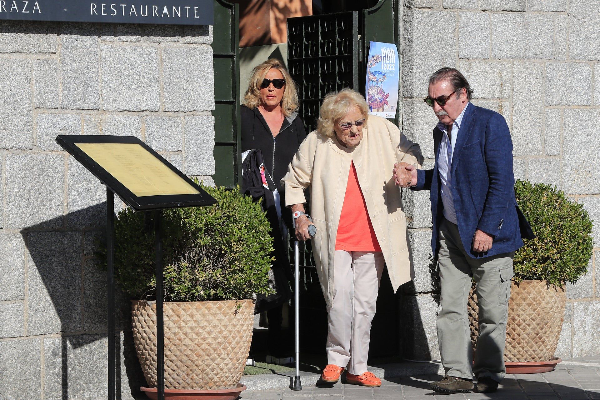 Lydia Lozano with her mother and Charly