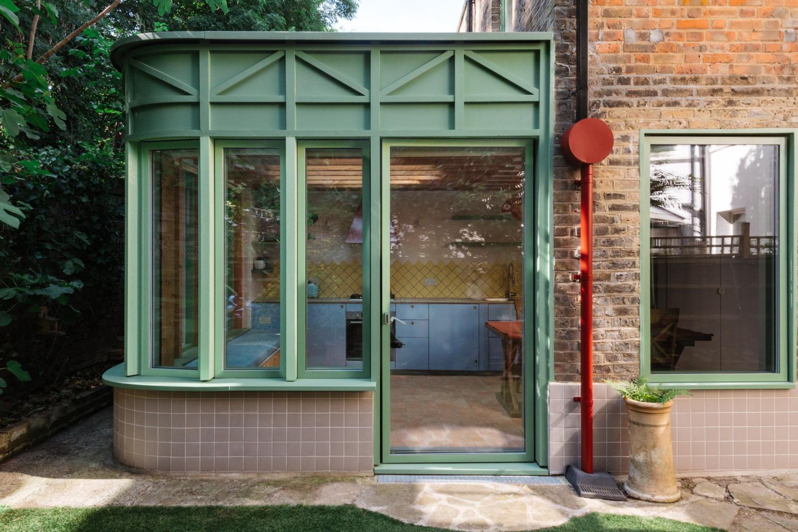 “The historic wall covered with ivy overflows with activity from playful squirrels to torchish pigeons and a fox ...