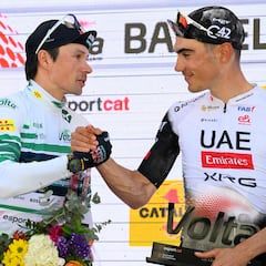 Roglic and Ayuso congratulate each other on the final podium of the Volta to Catalonia in Barcelona.