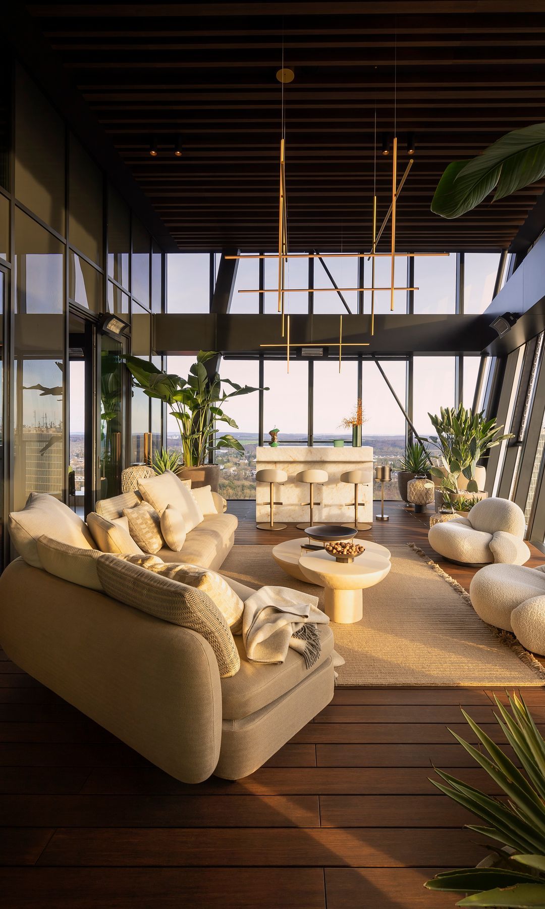 Living room with large windows, bar bar, wooden floor, white sofas, carpet
