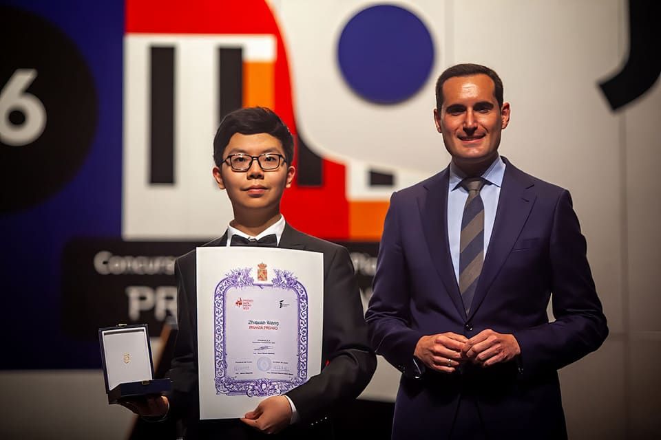 Chinese interpreter Zhiquan Wang is awarded the 66th edition of the Chinese interpreter Zhiquan Wang is awarded the 66th edition of the