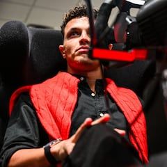 McLaren's Formula One British driver Lando Norris races in a simulator at Macy's Flagship Aventura Store for a meet-and-greet event in Aventura, Florida, on April 29, 2025. (Photo by CHANDAN KHANNA / AFP)