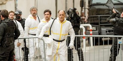 Frédéric Pierrot, in the foreground, and Johan Heldenbergh, second on the left, in an image of the series 'La Peste'.