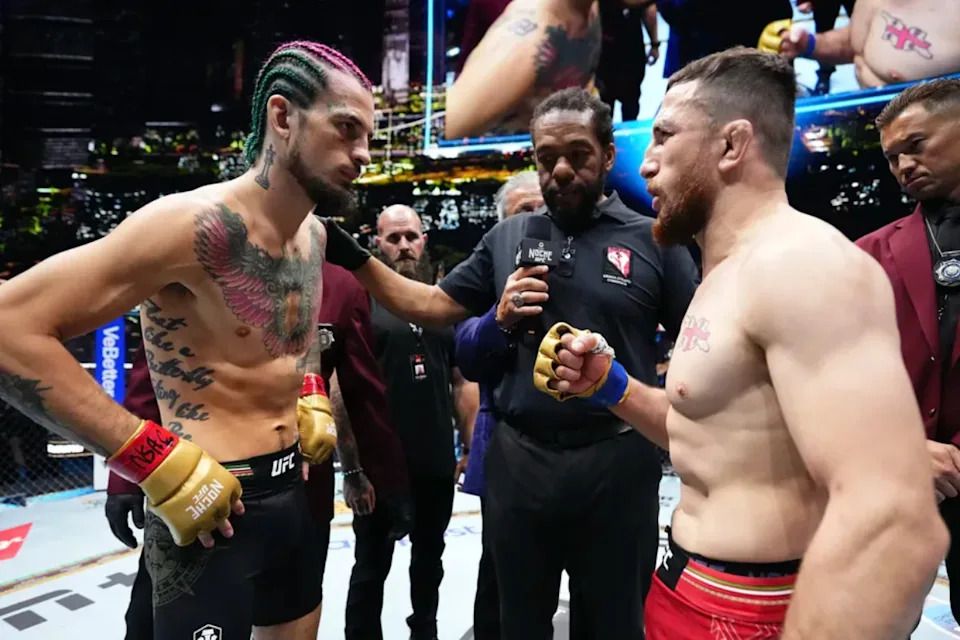 Sean O'Malley and Merab Dvalishvili lock eyes before their UFC 306 headliner begins.(via Zuffa LLC)