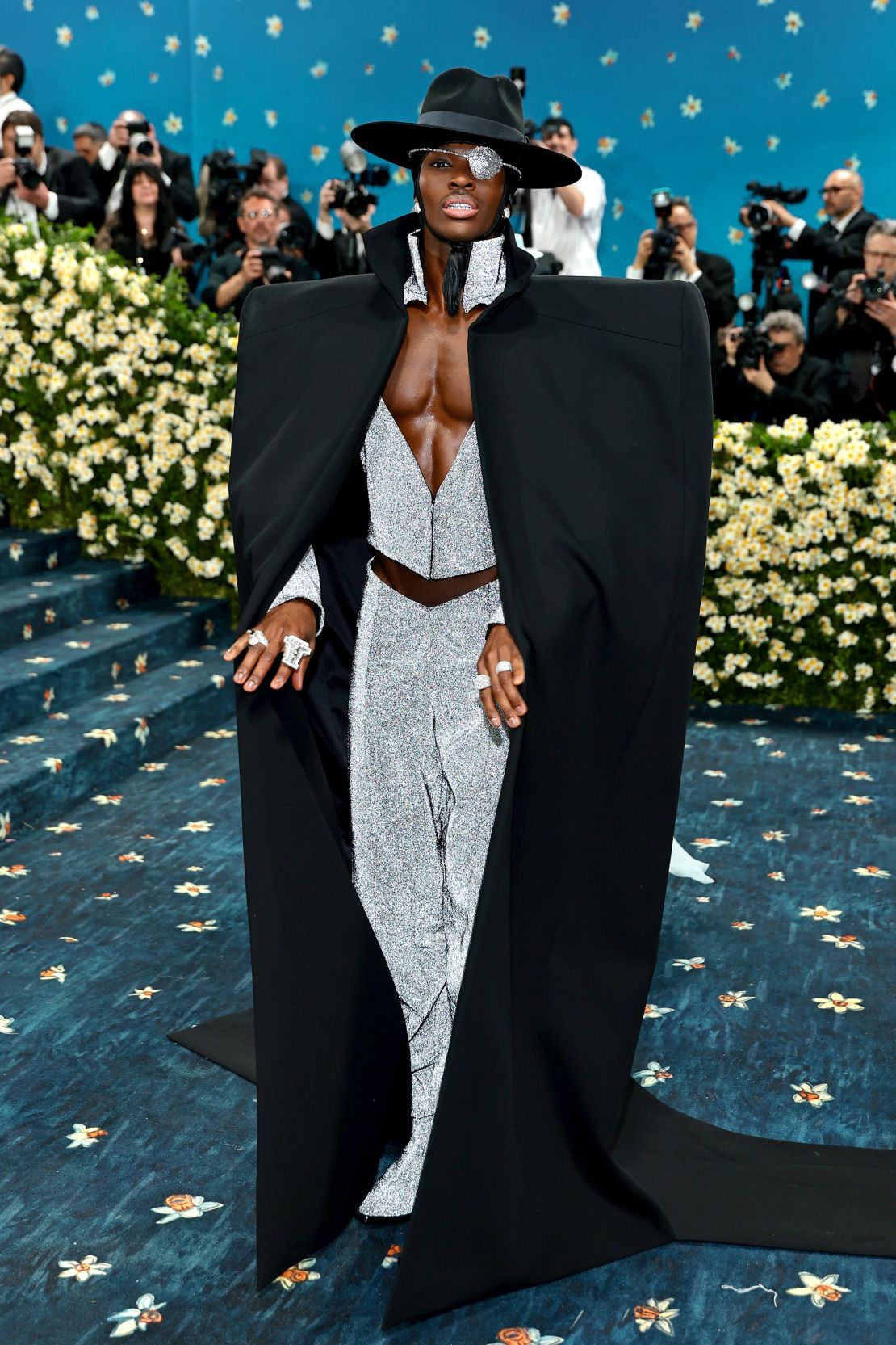 Model Alton Mason’s glittery chrome ensemble featured a unique heart-shaped neckline.
