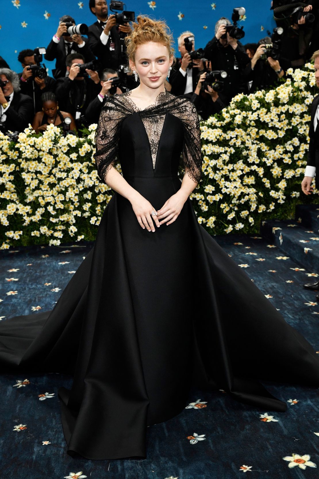 “Stranger Things” star Sadie Sink, a Prada brand ambassador, made her Met Gala debut in custom gothic look from the Italian label.