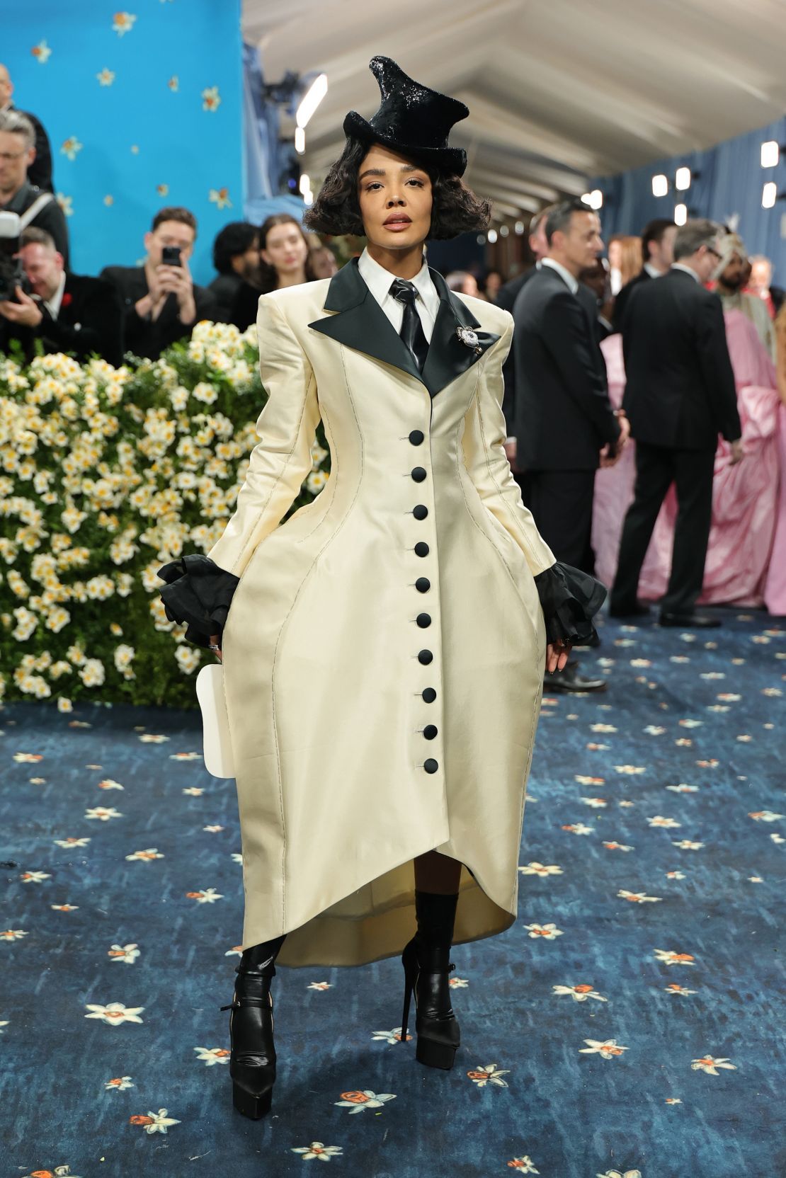 With her Met Gala look, Tessa Thompson aimed to signify “the way fashion illustrates our dignity,” she told Billboard. Her old-school church fan featured the face of Vogue’s former editor-at-large André Leon Talley, whom many Met Gala guests honored tonight.