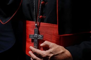 Cardinal Jean-Paul Vesco arrives ahead