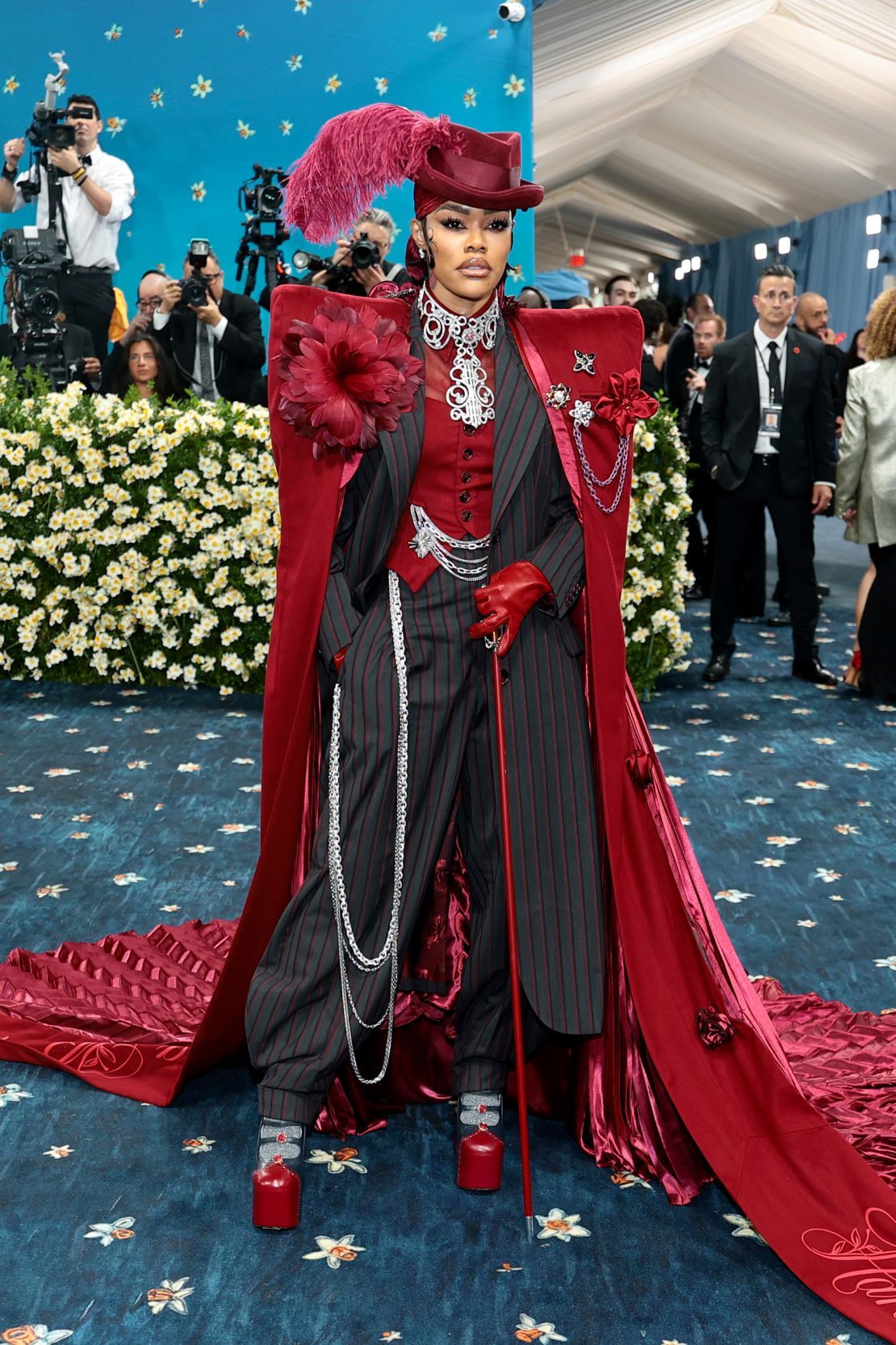 Teyana Taylor’s look, by Marc Jacobs, was finished with an extravagant, pleated crimson red cape embroidered with “Harlem Rose.”
