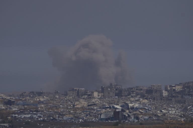 Smoke rises in the sky of the Gaza Strip, seen from southern Israel, on Tuesday, May 6, 2025.