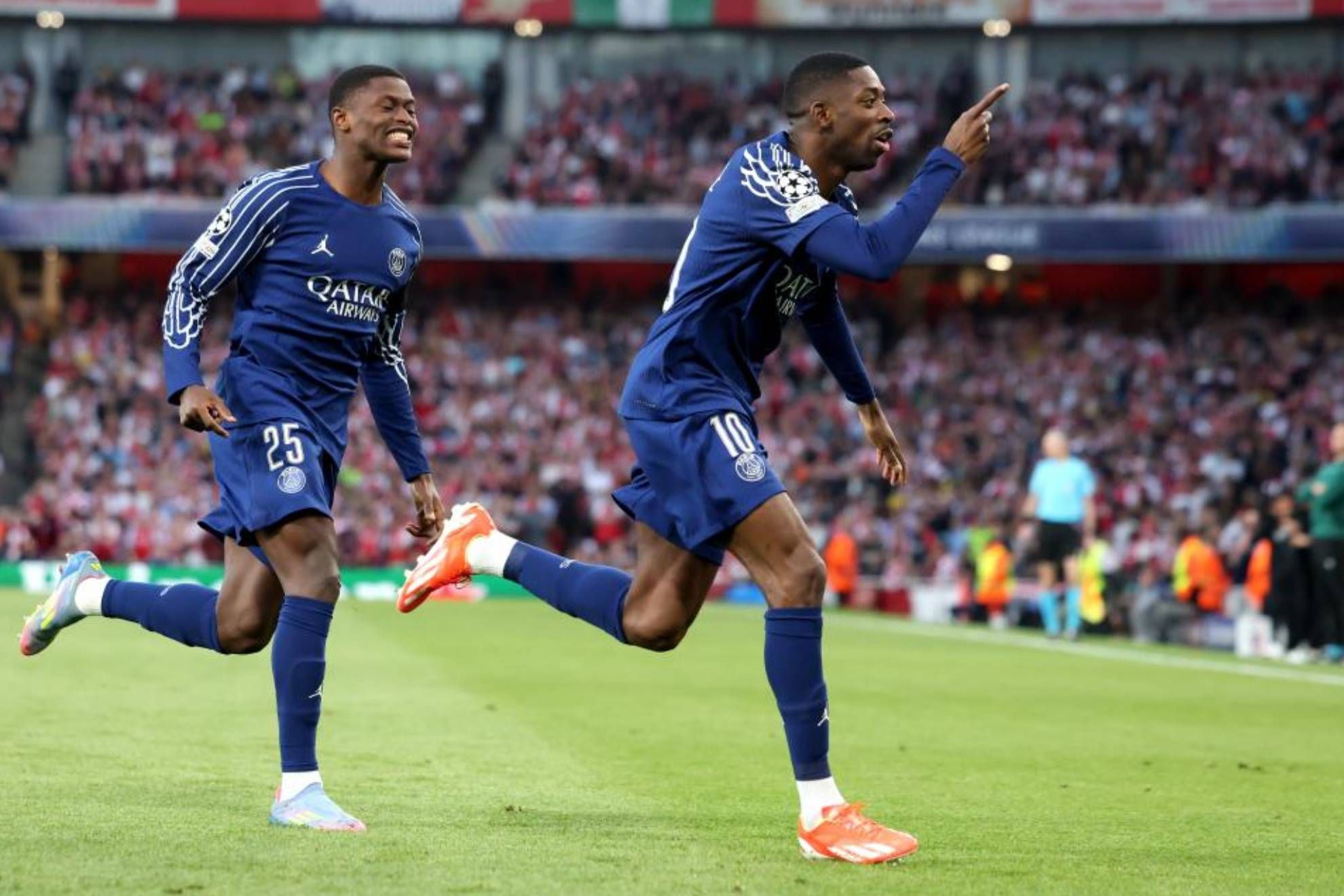 Dembélé celebrates his goal to Arsenal in the first leg.