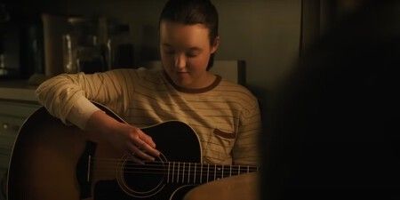 Ellie with a guitar in 'The Last of Us'