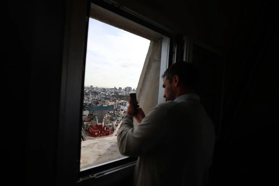 A person takes photographs from the Obelisk viewpoint this Thursday in Buenos Aires (Argentina). EFE/Matías Martín Campaya