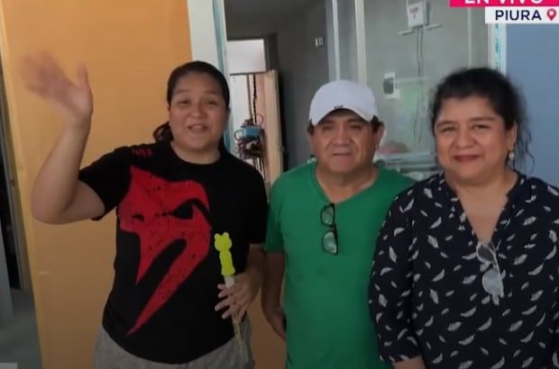 Mildred Camacho and his parents