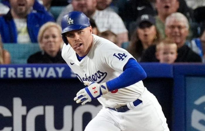Freeman hits key hit in the eighth and Dodgers come back against KC