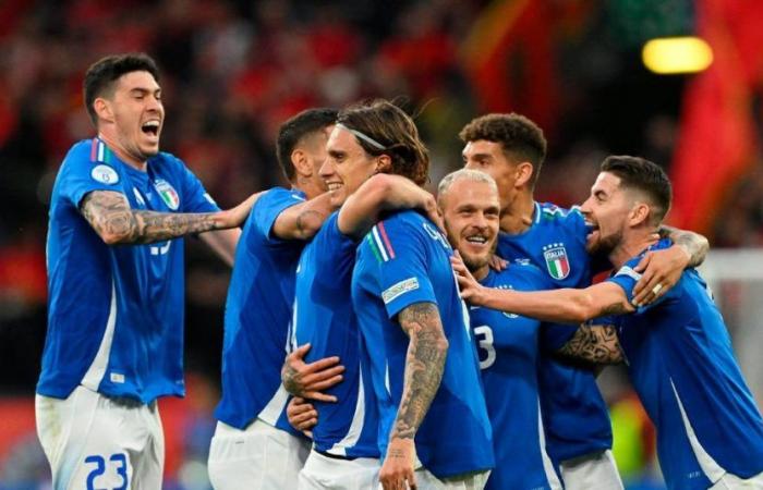 Italy began defense of the Euro Cup title with a suffered victory against Albania