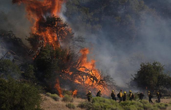 Wildfire burning north of Los Angeles spreads as evacuation orders are issued