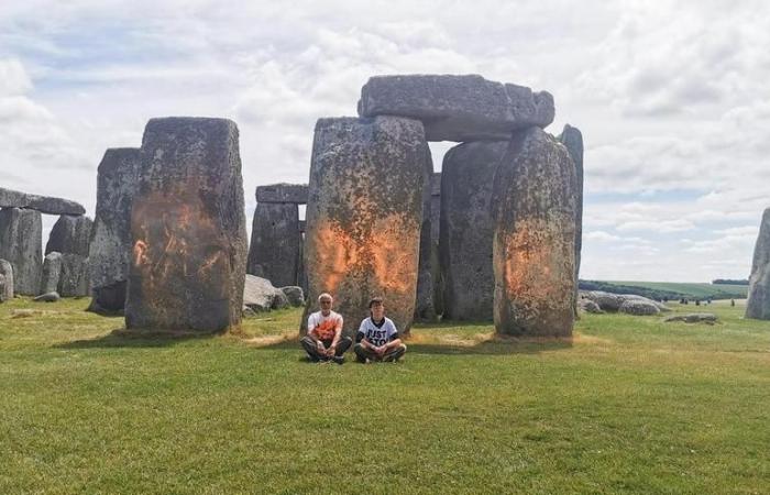 Two arrested after spraying Stonehenge monument with orange paint