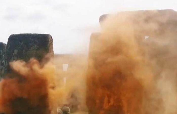 Two environmentalists sprayed paint on the famous prehistoric monument of Stonehenge