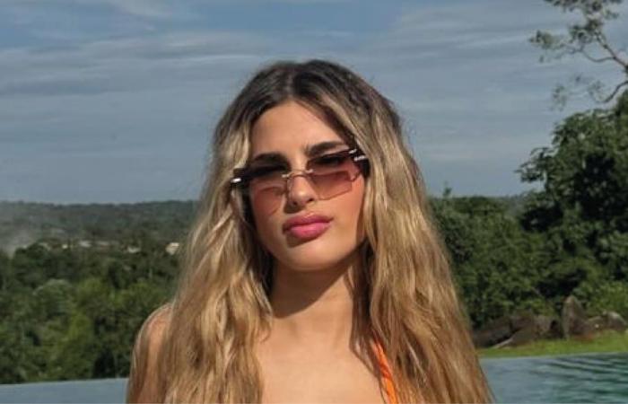 Julieta Poggio posed in a two-color MICROBIKINI from a luxurious hotel in Iguazú Falls