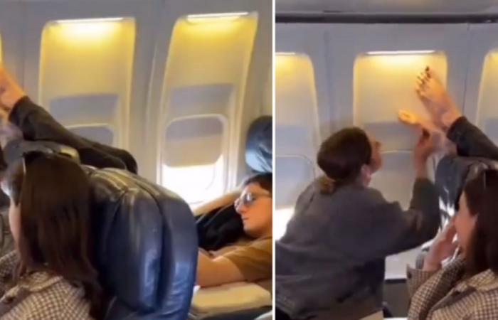passenger puts his feet on another occupant’s seat and she paints her nails in response