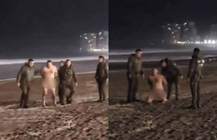 They arrest a man on the shores of the beach in Iquique