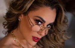 From behind, Ninel Conde shows off her curves wearing a micro bikini
