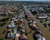 Brazilians queue for precious water as flood damage intensifies