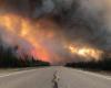 Flames roll across highways as roads south of NWT close