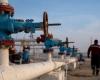 Oil prices ease on strong US dollar, mixed global economic news